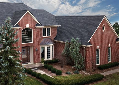 red brick house remodel metal roof|black shingles on brick house.